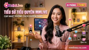 Banner tiểu sử Tiểu Quyên MMLive, cập nhật phong cách duyên dáng với ID phòng 774921. Hình ảnh nữ streamer xinh đẹp mỉm cười rạng rỡ đang ngồi trước micro trong không gian phòng live ấm áp, kèm các biểu tượng tương tác ảo và tên miền mmlive8.jp.net.